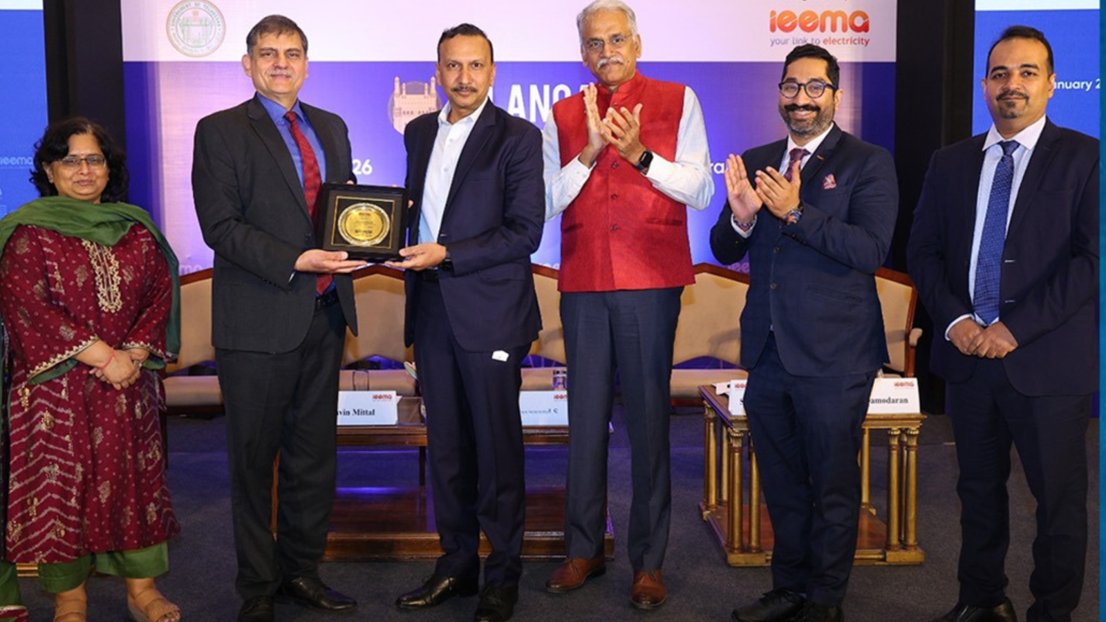 IEEMA officials and Telangana government representatives on stage at the Telangana Power Conclave 2026 in Hyderabad, during a plaque presentation ceremony, with the event backdrop visible.