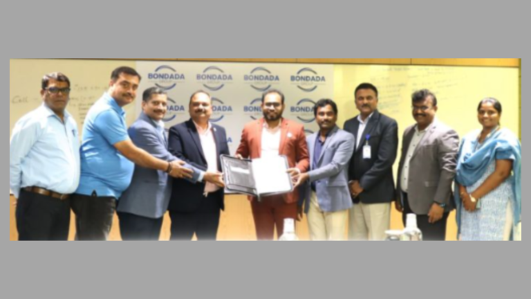 Representatives of Insolation’s subsidiary and Bondada Engineering exchange signed documents during an MoU signing for ALMM-compliant solar module supply.