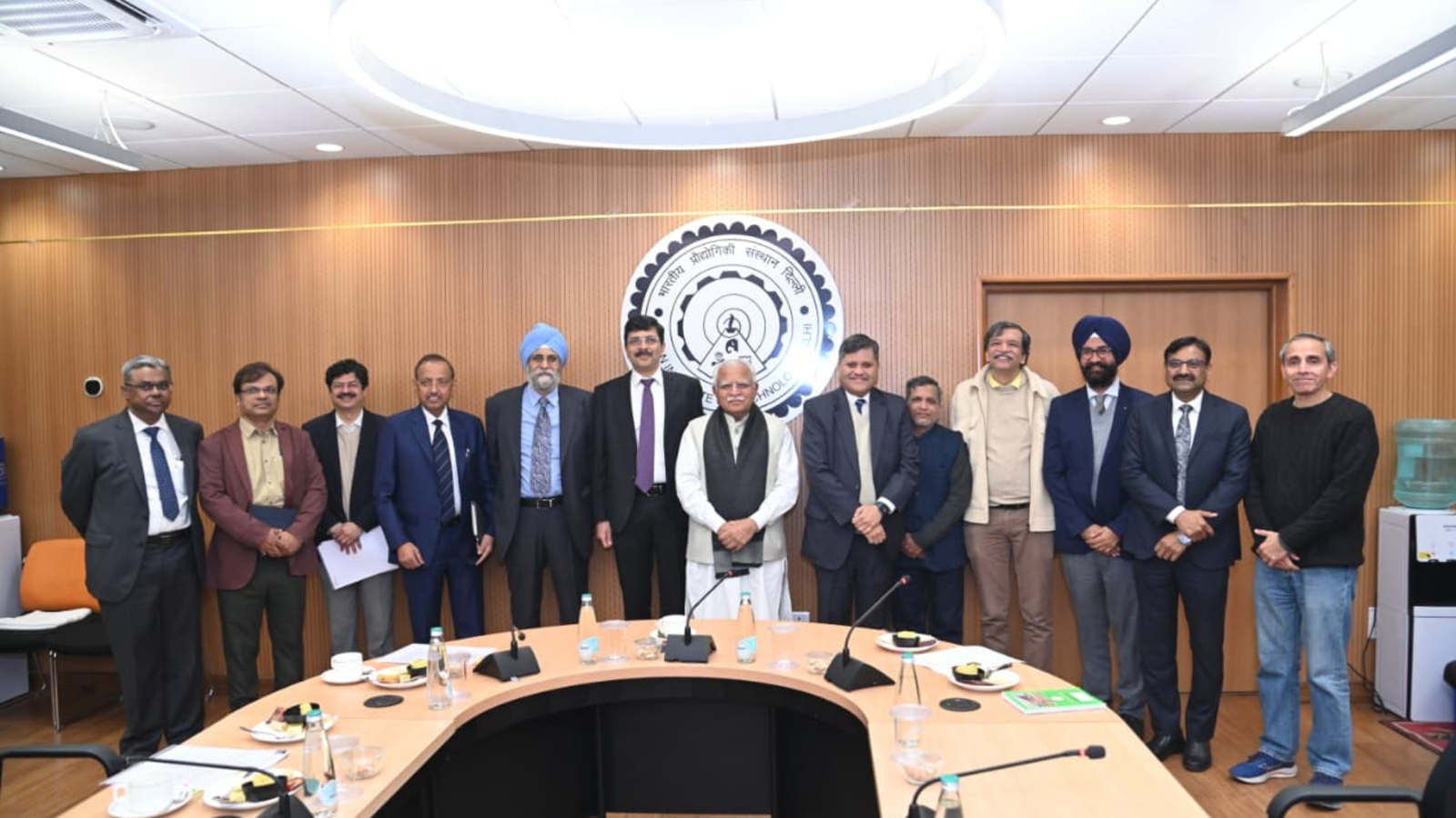 Union Power Minister Manohar Lal with officials from IIT Delhi, CERC, and Grid India during the launch of the Centre of Excellence for Regulatory Affairs in the Power Sector.