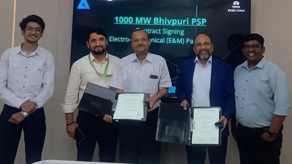 Officials from ANDRITZ and Tata Power holding signed documents at the contract signing for the 1,000 MW Bhivpuri pumped storage project in Maharashtra