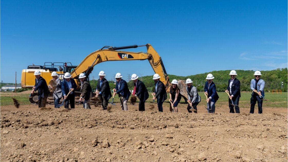 Kairos Power officials break ground for Hermes 2 molten salt reactor project in Oak Ridge, Tennessee, with excavator and construction team on site