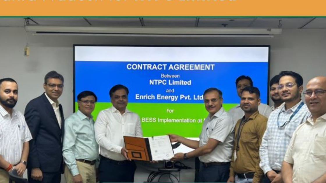 Officials from NTPC Limited and Enrich Energy Pvt. Ltd. exchange signed documents during a contract signing ceremony for a 290 MWh BESS project at Simhadri Thermal Power Station