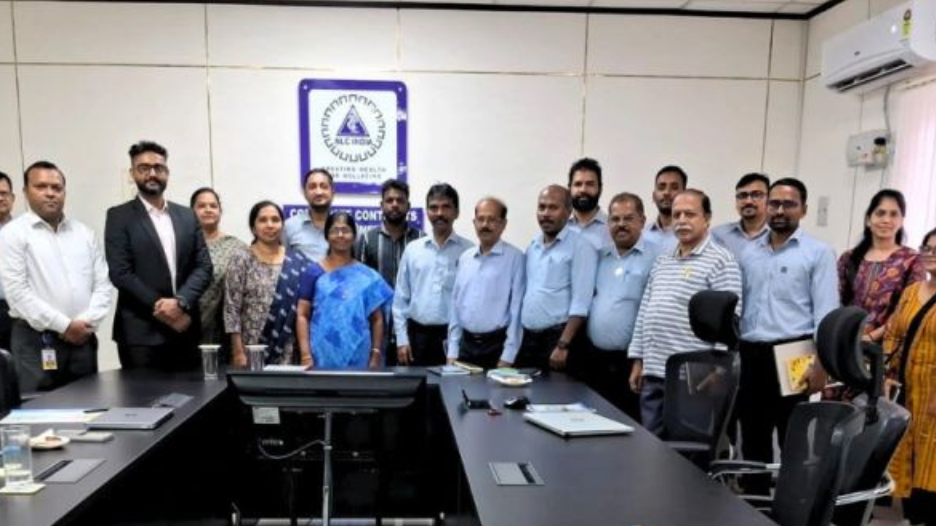 Officials from NLC India Limited and Pace Digitek pose for a group photograph in a conference room following the signing of an EPC contract for a 250 MW/500 MWh standalone Battery Energy Storage System (BESS) project in Tamil Nadu.