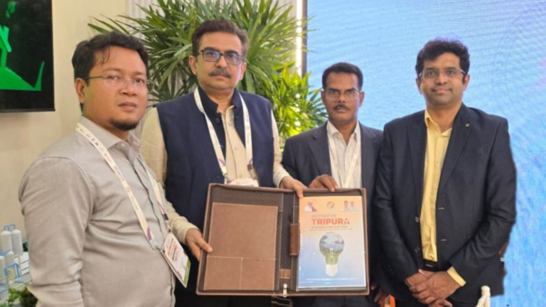 Officials from REC Limited and the Government of Tripura pose with signed MoU documents at the Destination Tripura Business Conclave 2026, where REC committed up to Rs 15,000 crore for renewable energy and power infrastructure projects in the state.
