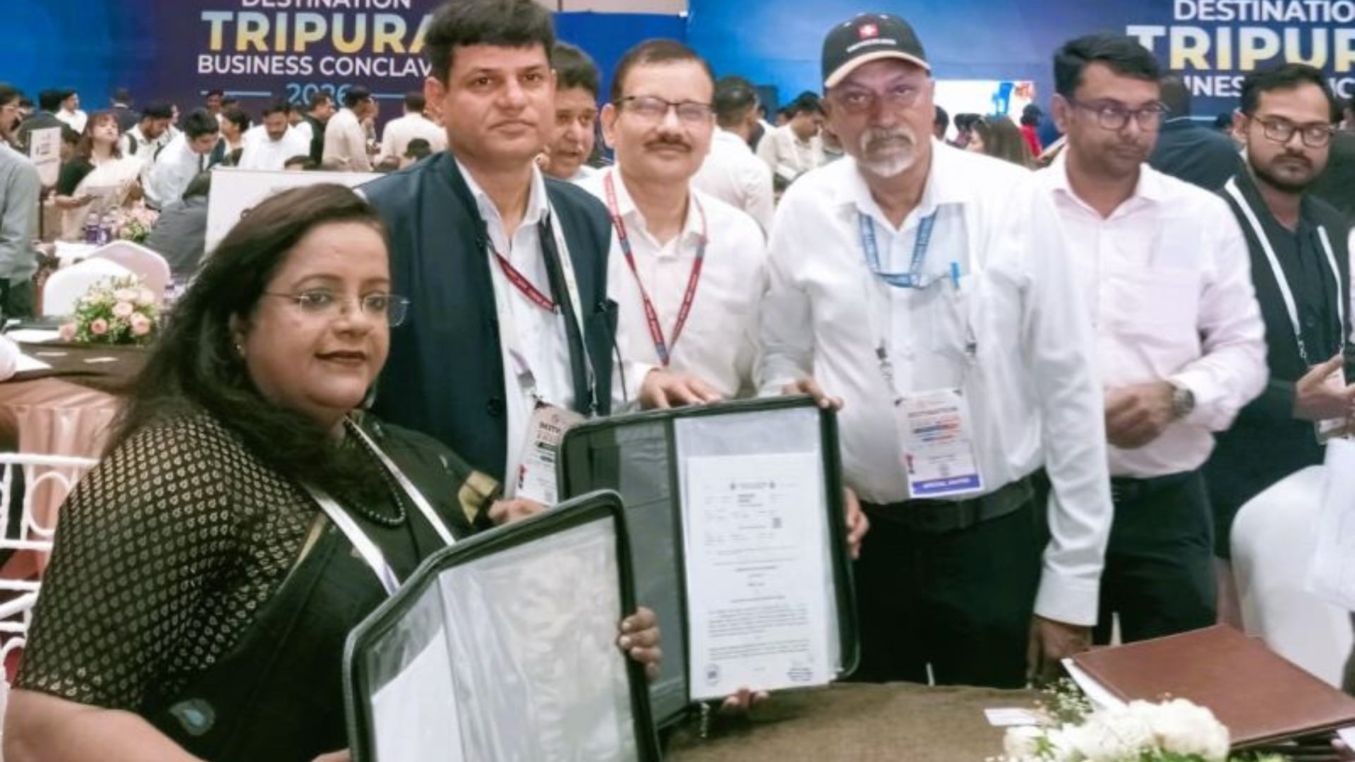 Officials from NHPC Limited and Tripura State Electricity Corporation Ltd. display the signed Power Purchase Agreement during the Destination Tripura: Business Conclave 2026 in Agartala for electricity supply from the 1,720 MW Kamala Hydro Electric Project.