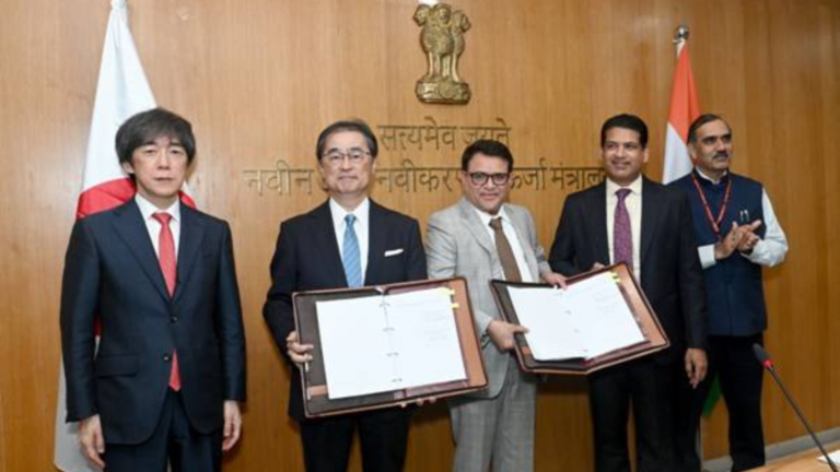 Representatives of ACME Group, IHI Corporation and Mitsubishi Gas Chemical Company display signed green ammonia and green methanol offtake agreements at the Ministry of New and Renewable Energy in New Delhi, in the presence of Indian and Japanese officials.