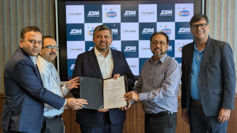 Energy In Motion, Oil Field Warehouse & Services Limited (OWS) and Radiance Green Mobility during the signing of the strategic MoU to scale electric freight mobility across key corridors in India.