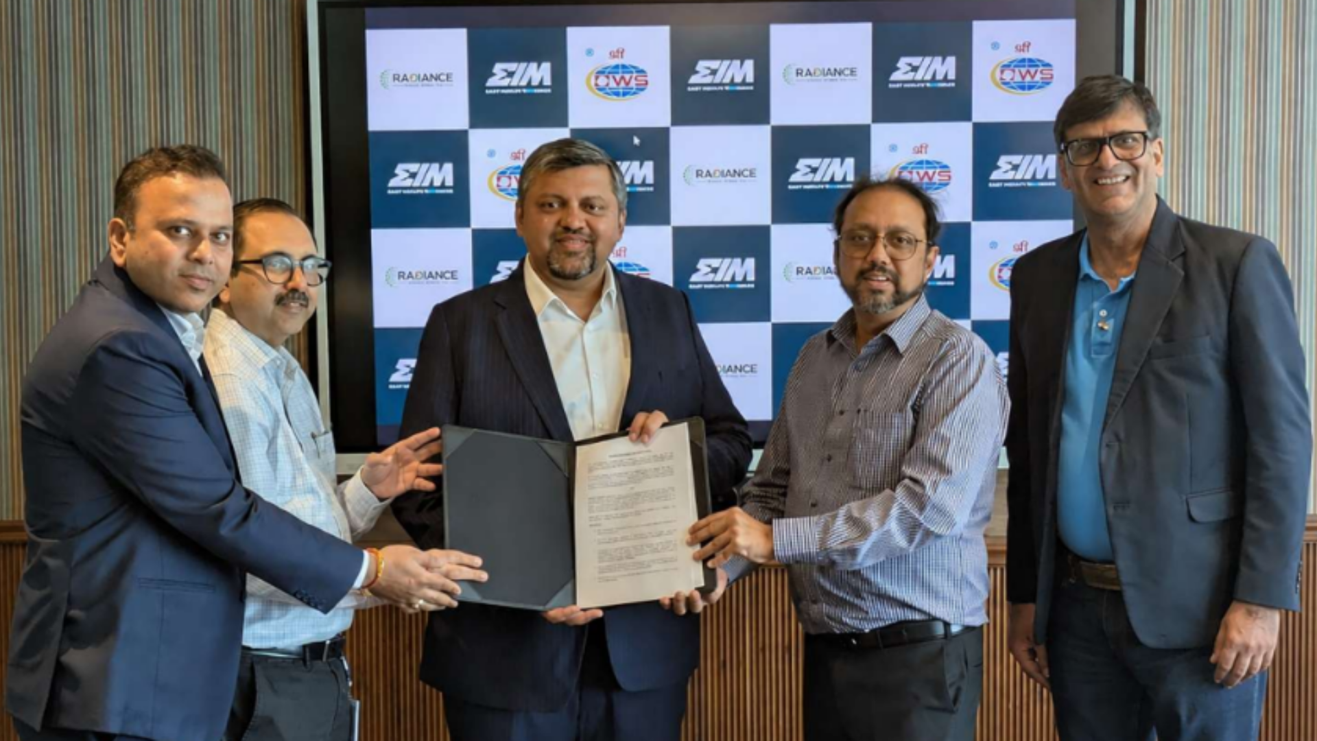 Energy In Motion, Oil Field Warehouse & Services Limited (OWS) and Radiance Green Mobility during the signing of the strategic MoU to scale electric freight mobility across key corridors in India.